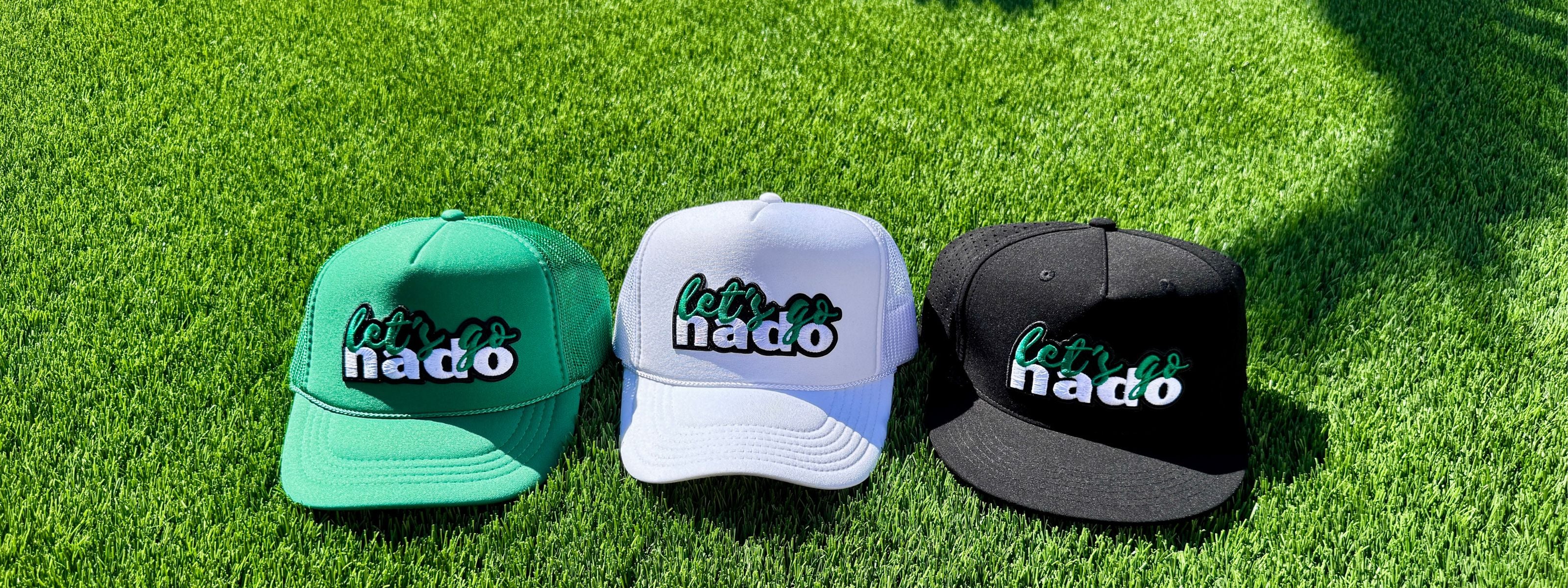 Let's Go Nado hat collection, green and white foam hats and black flat brim hat
