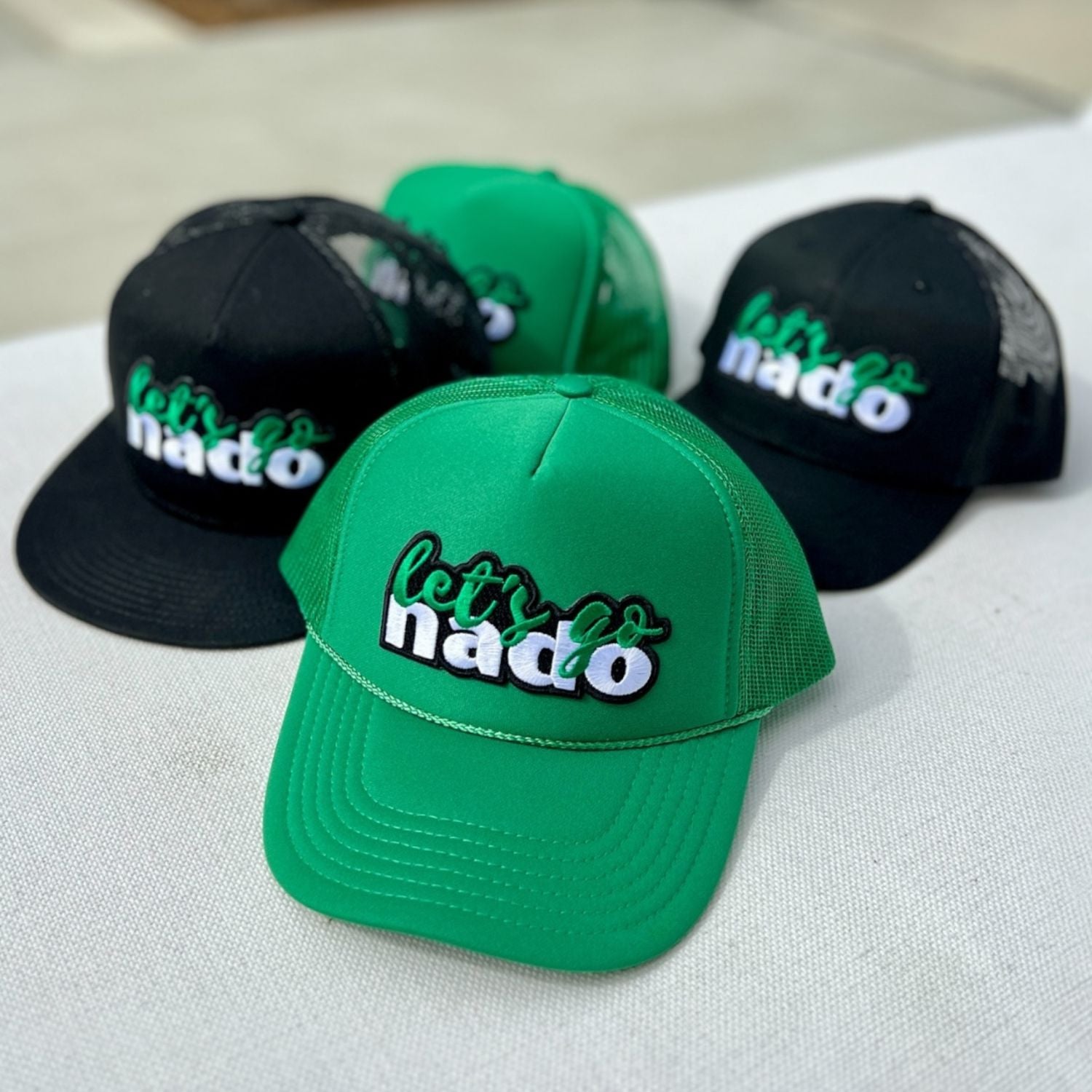 Let's Go Nado Collection Coronado green and black foam hats and truckers