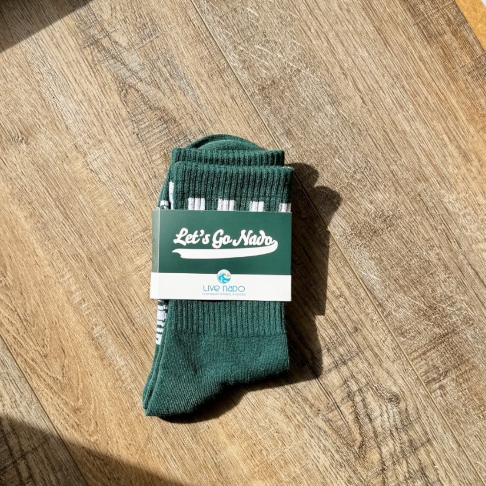 Green sock in packaging