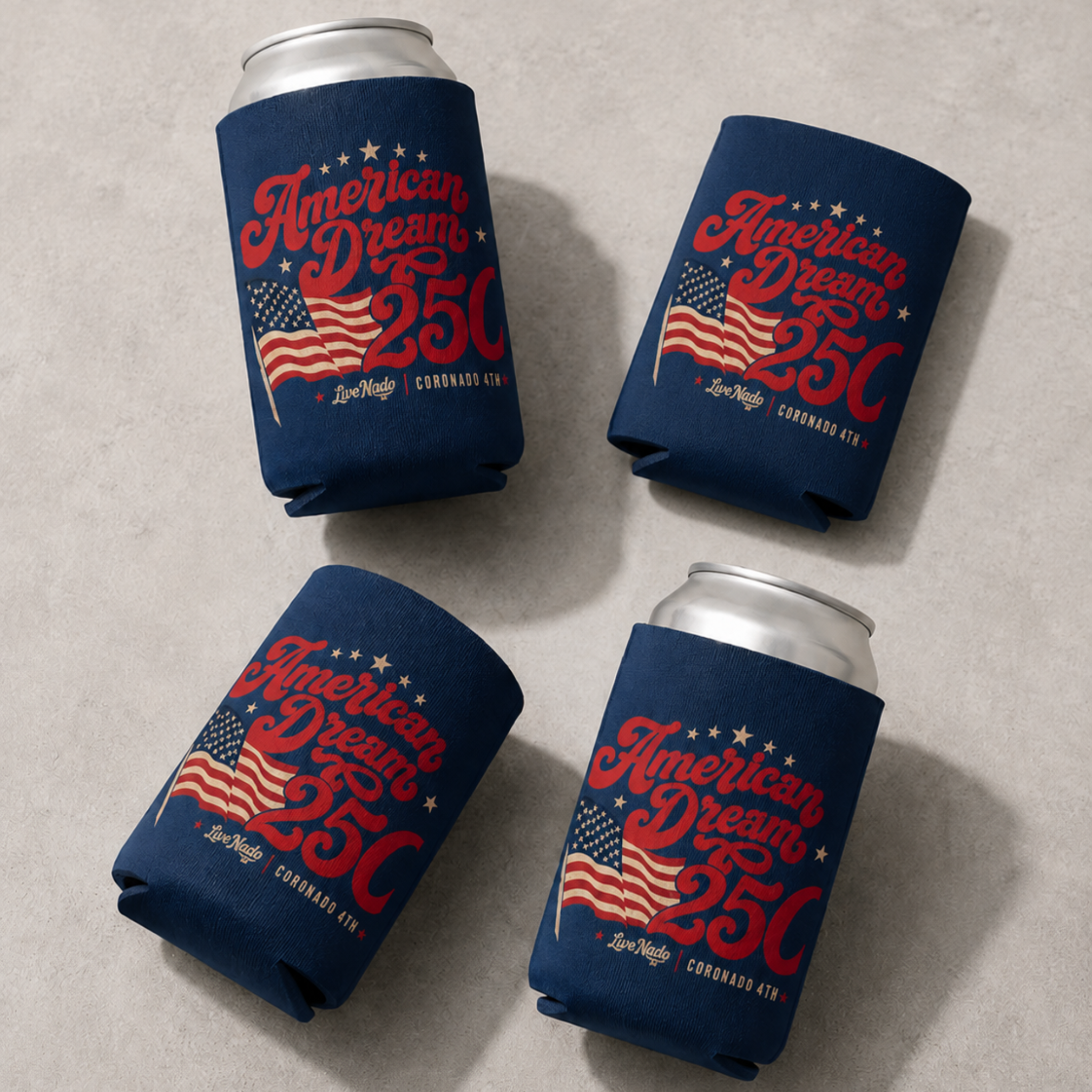 Four blue can coolers with 'American Dream 25C' text and American flag design on a gray surface.
