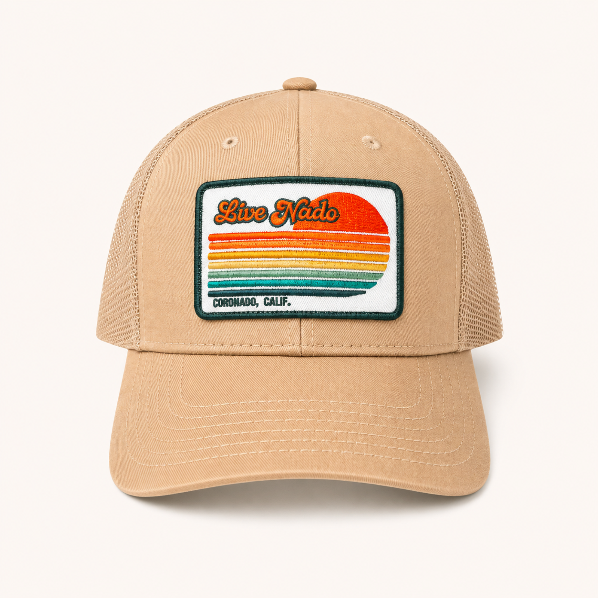 Beige cap with a colorful patch on a white background