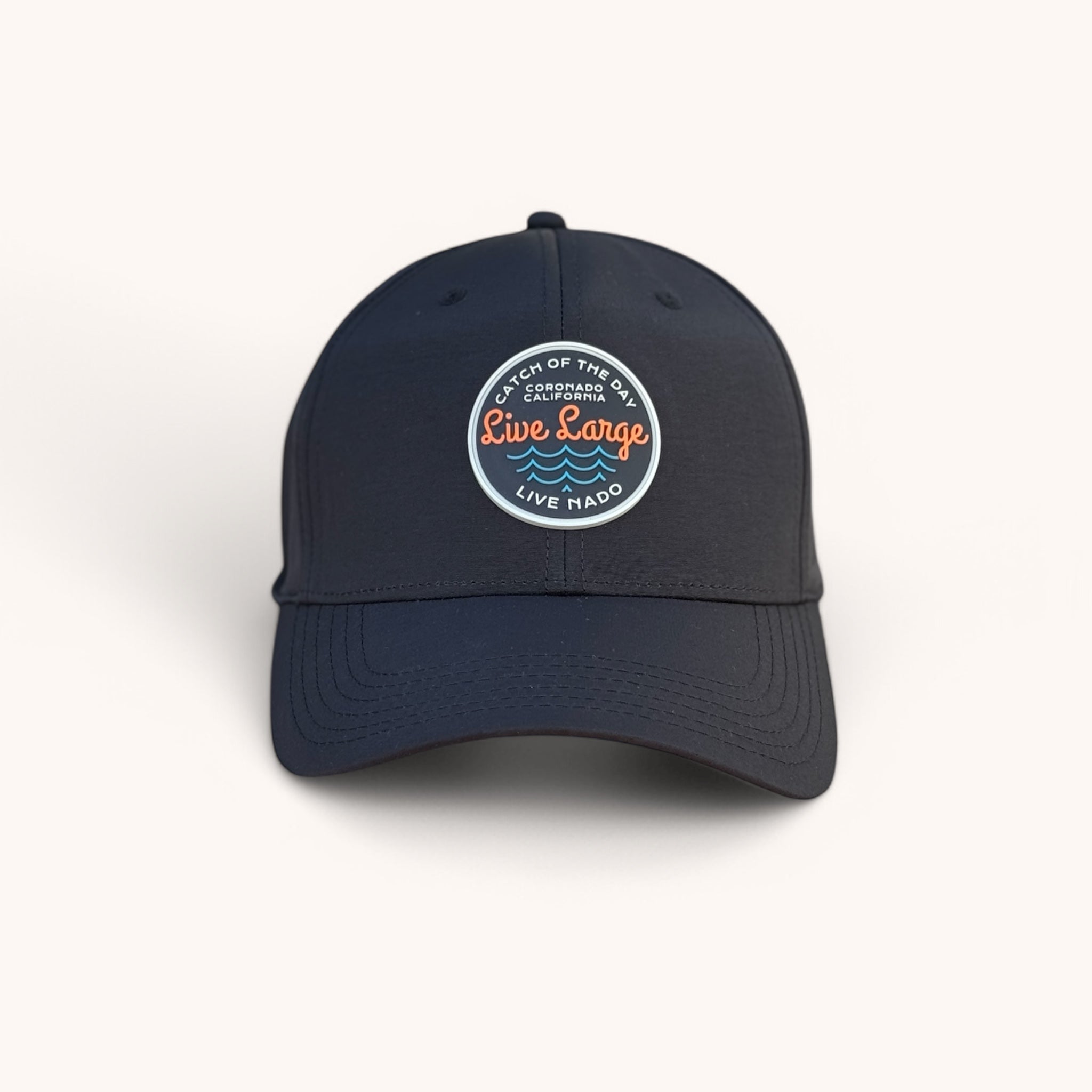 Navy blue cap with a circular logo on a white background