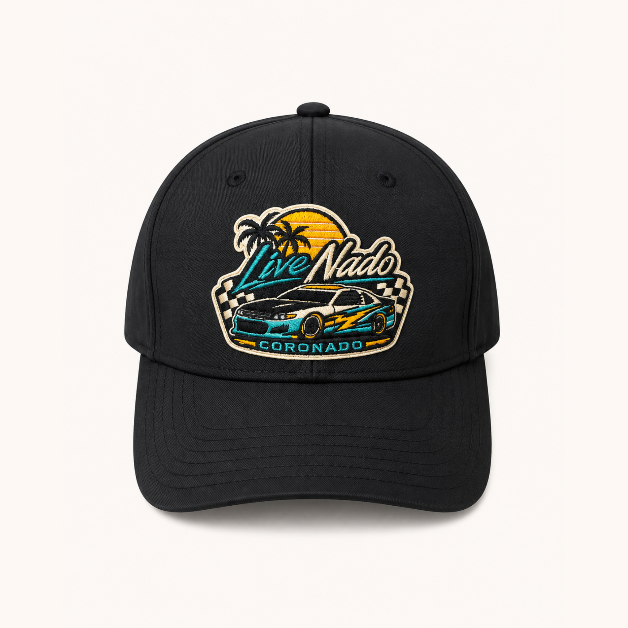 Black cap with embroidered design of a car and 'Live Nado Coronado' text on a white background
