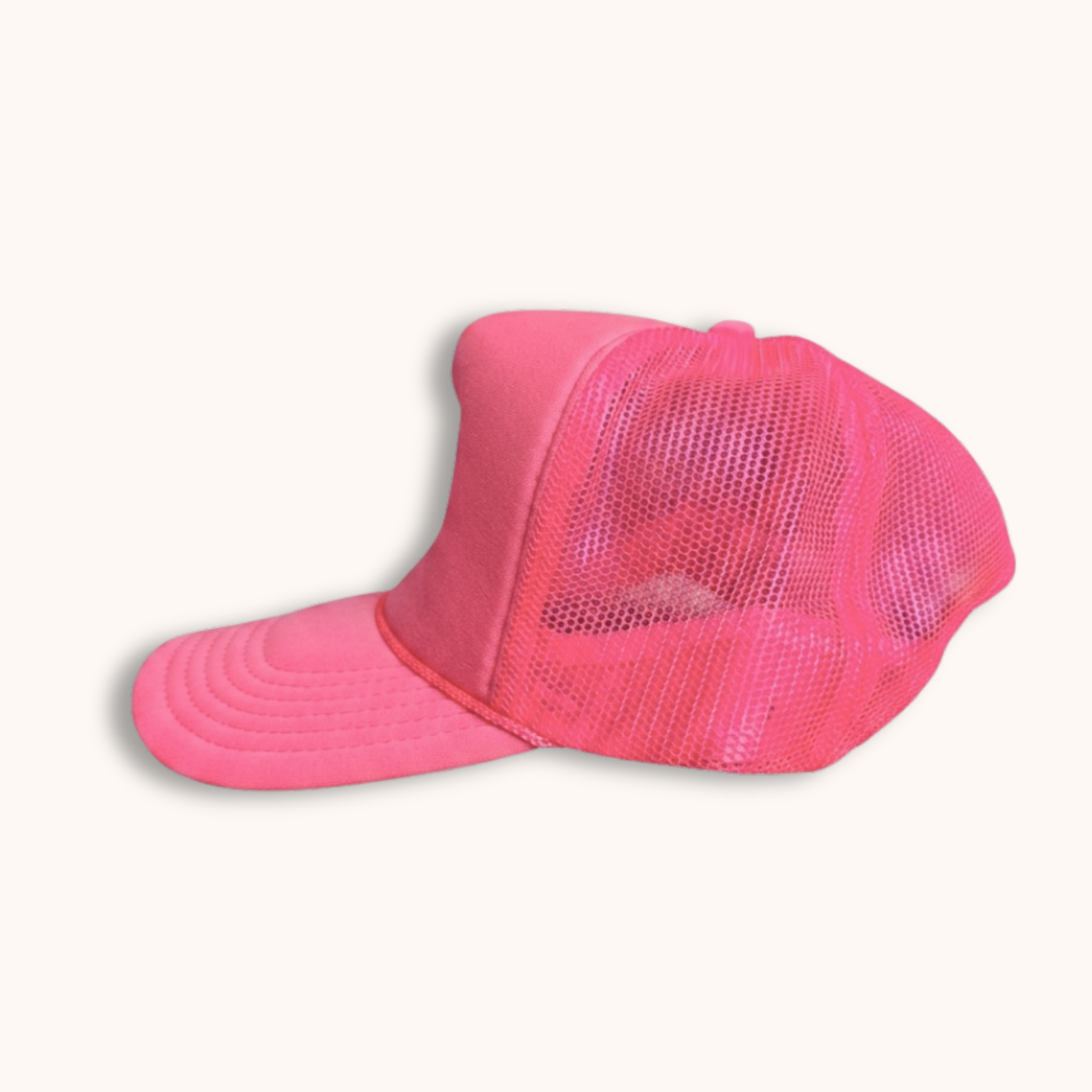 Pink mesh cap on a white background