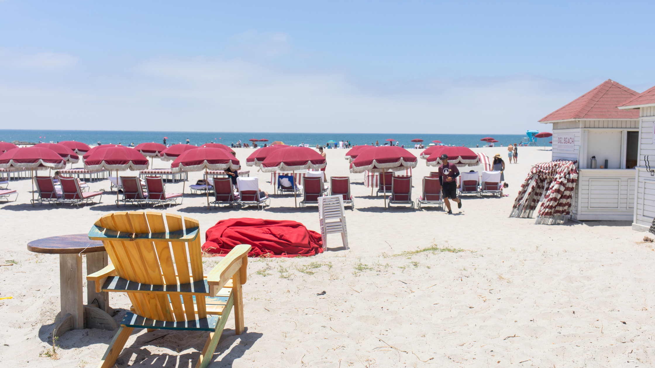 beach umbrellas and chairs with an ocean view