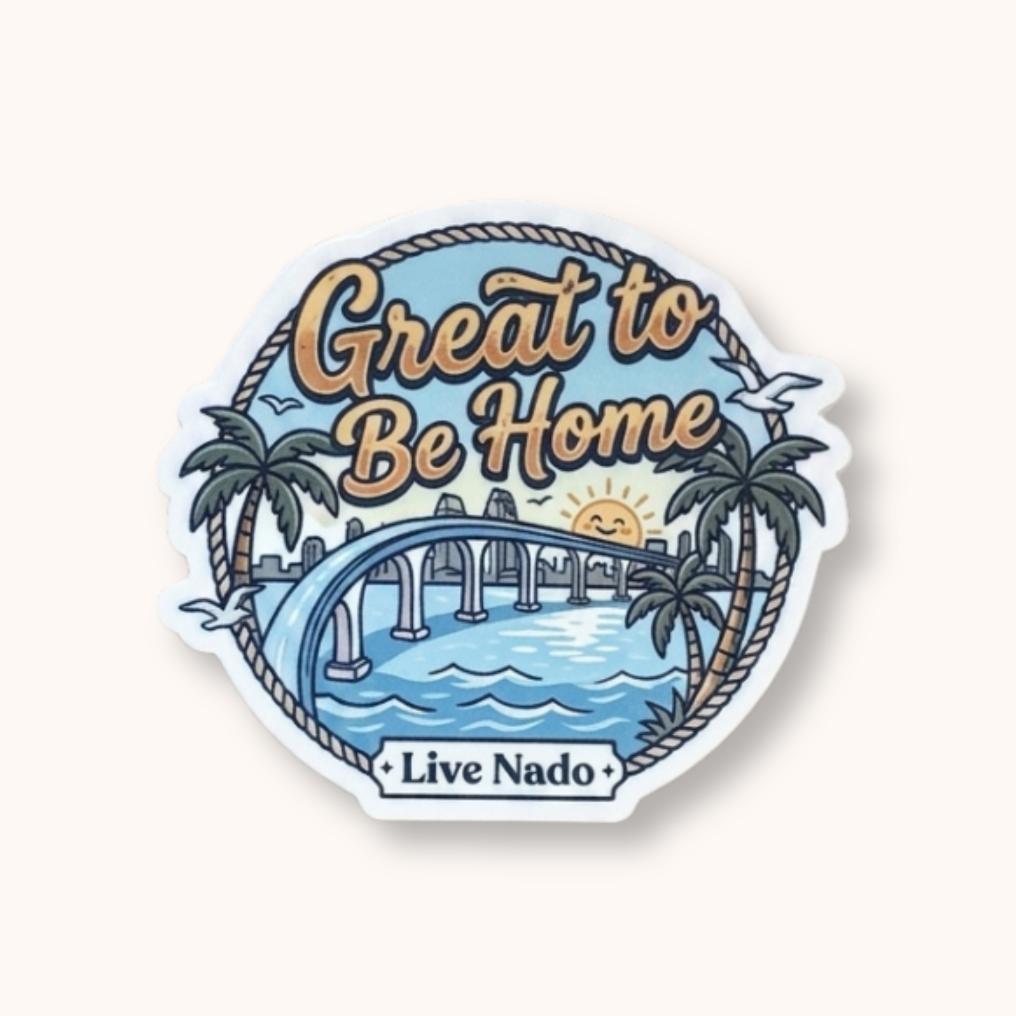 Sticker with 'Great to Be Home' text and a scenic design of palm trees, bridge, and water.
