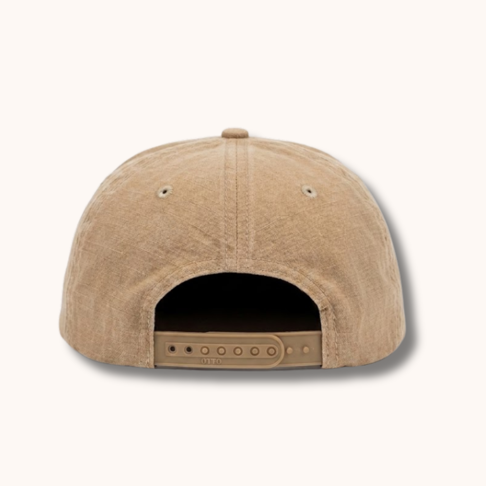 Beige cap with open back on a white background