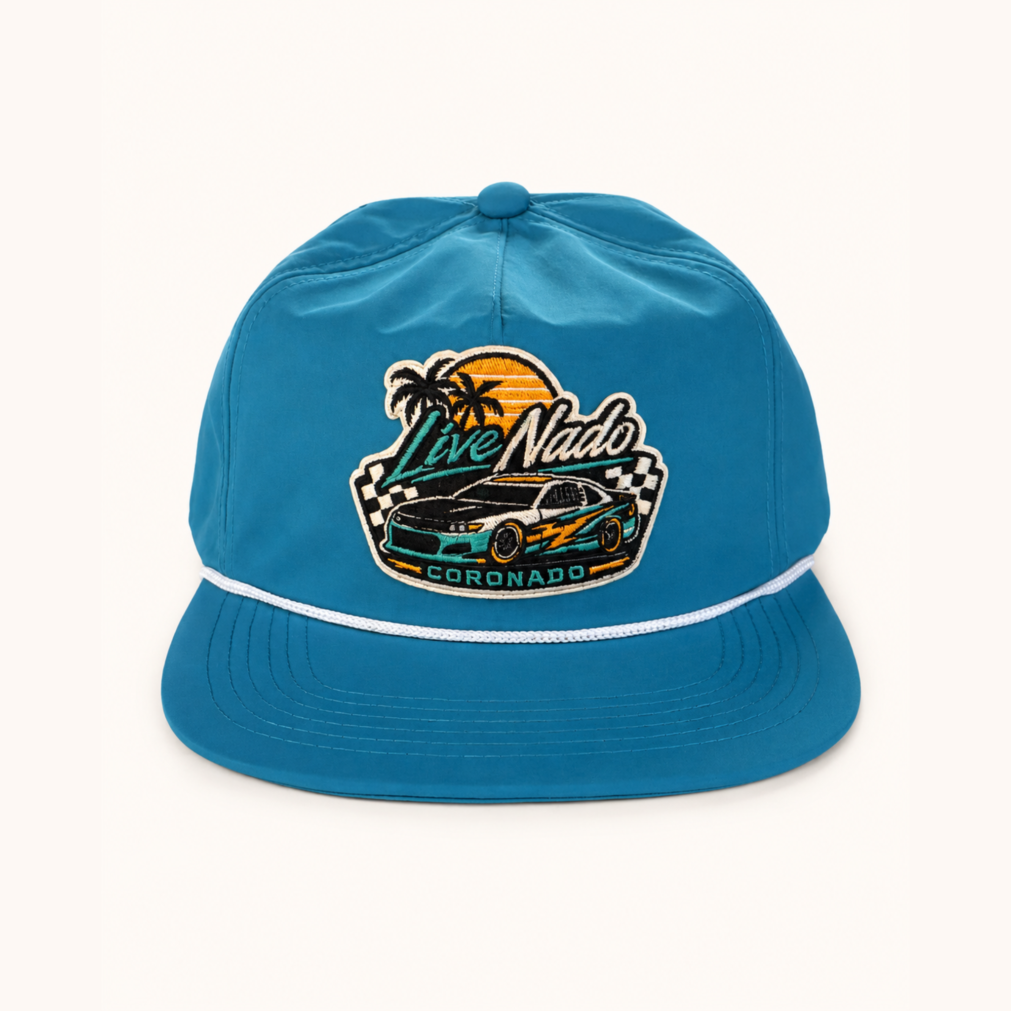 Blue bucket hat with a car and palm tree design on a white background