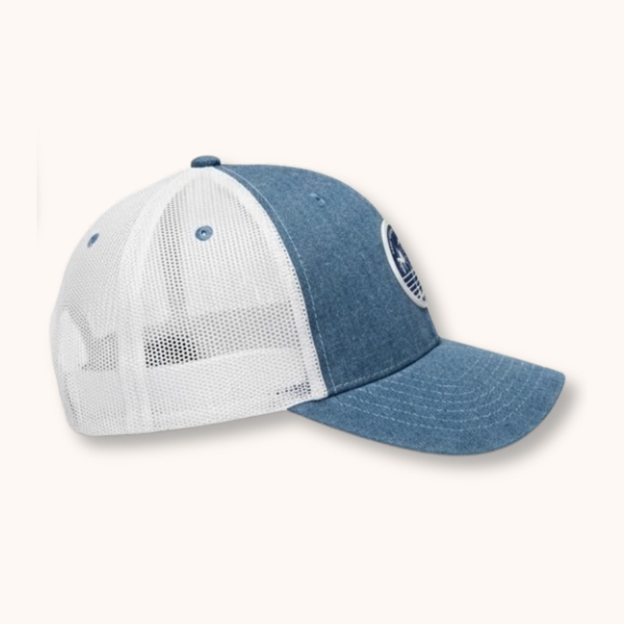 Blue and white mesh cap on a white background
