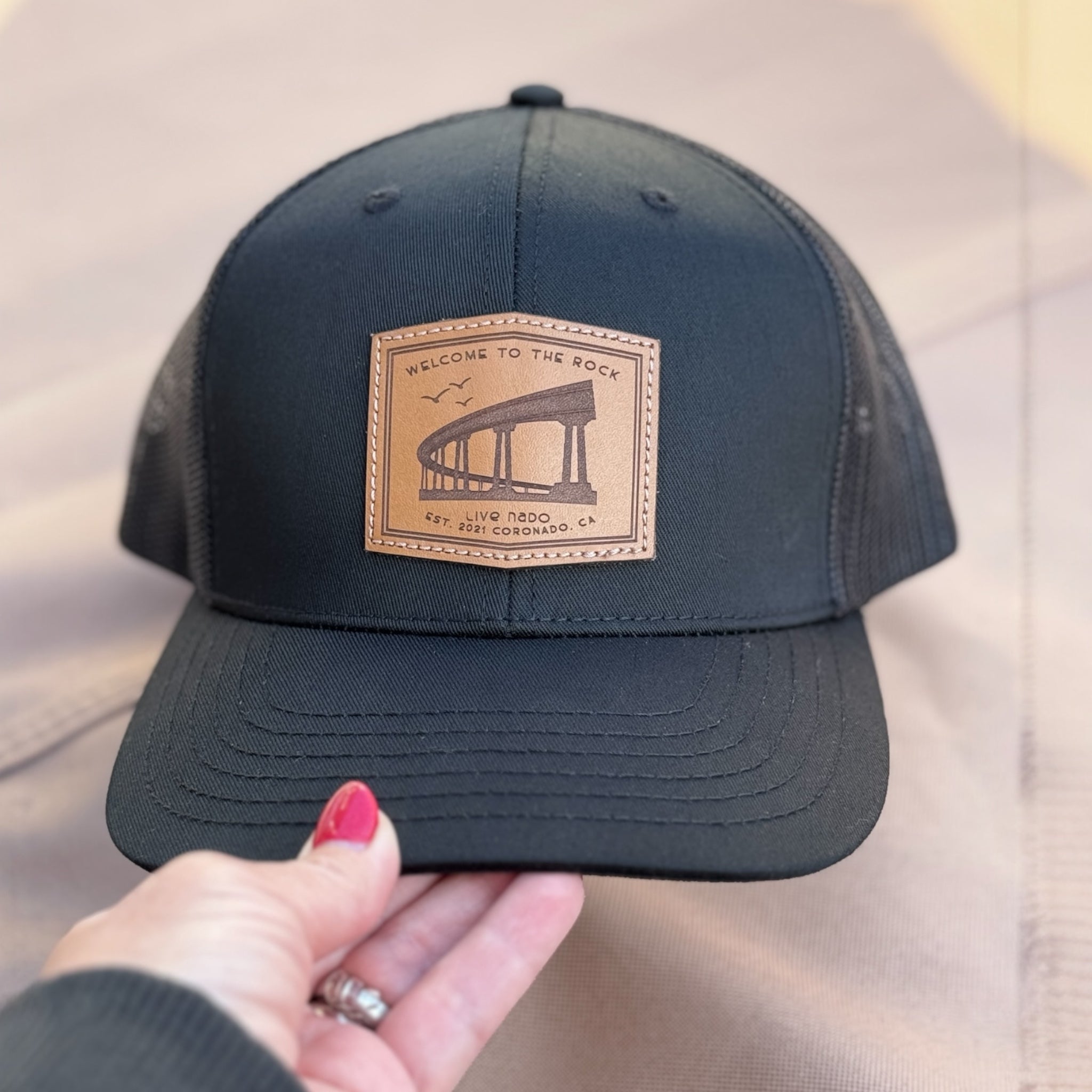 DUNES | "WELCOME TO THE ROCK" LEATHER PATCH TRUCKER