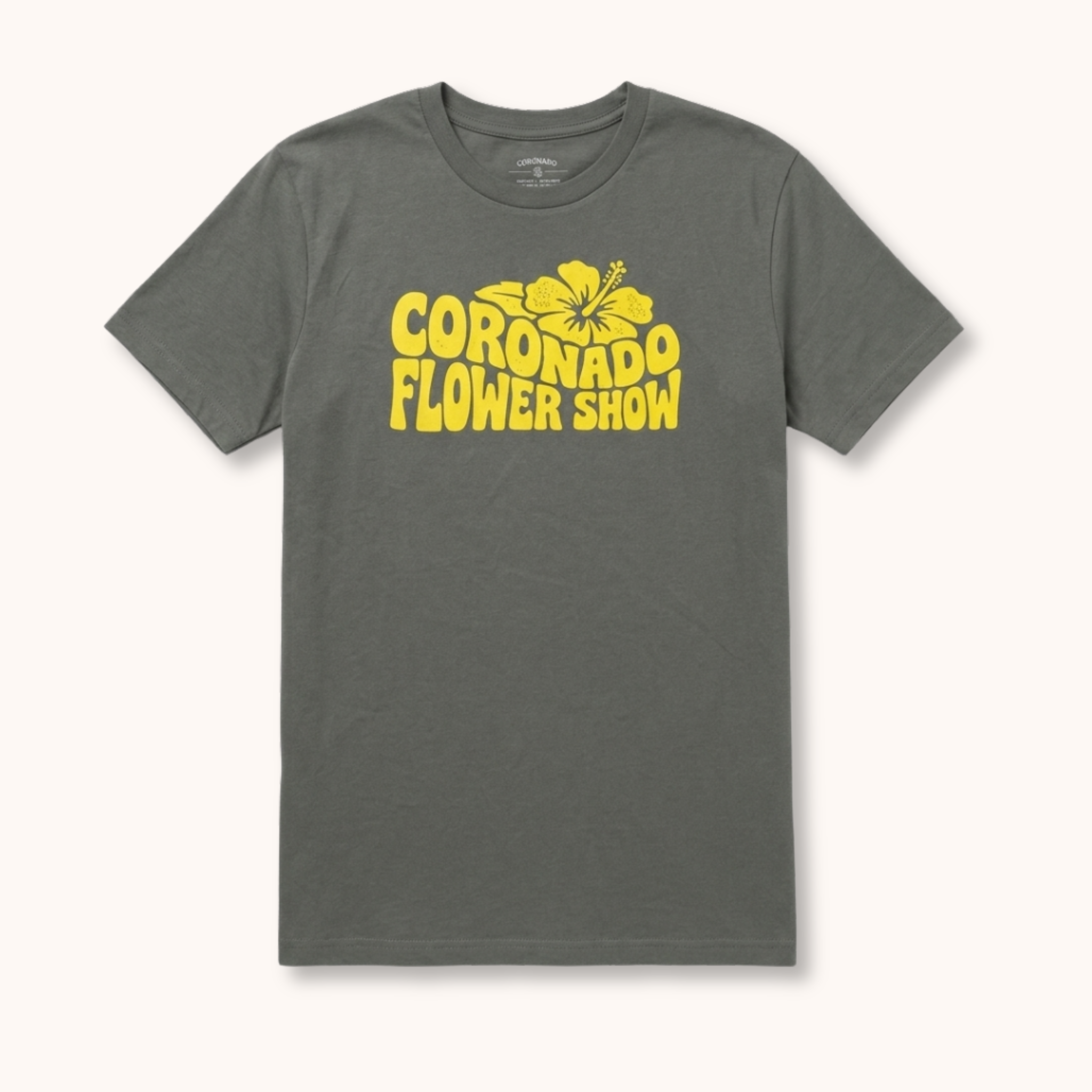 Gray t-shirt with yellow 'Coronado Flower Show' text and flower graphic on a white background