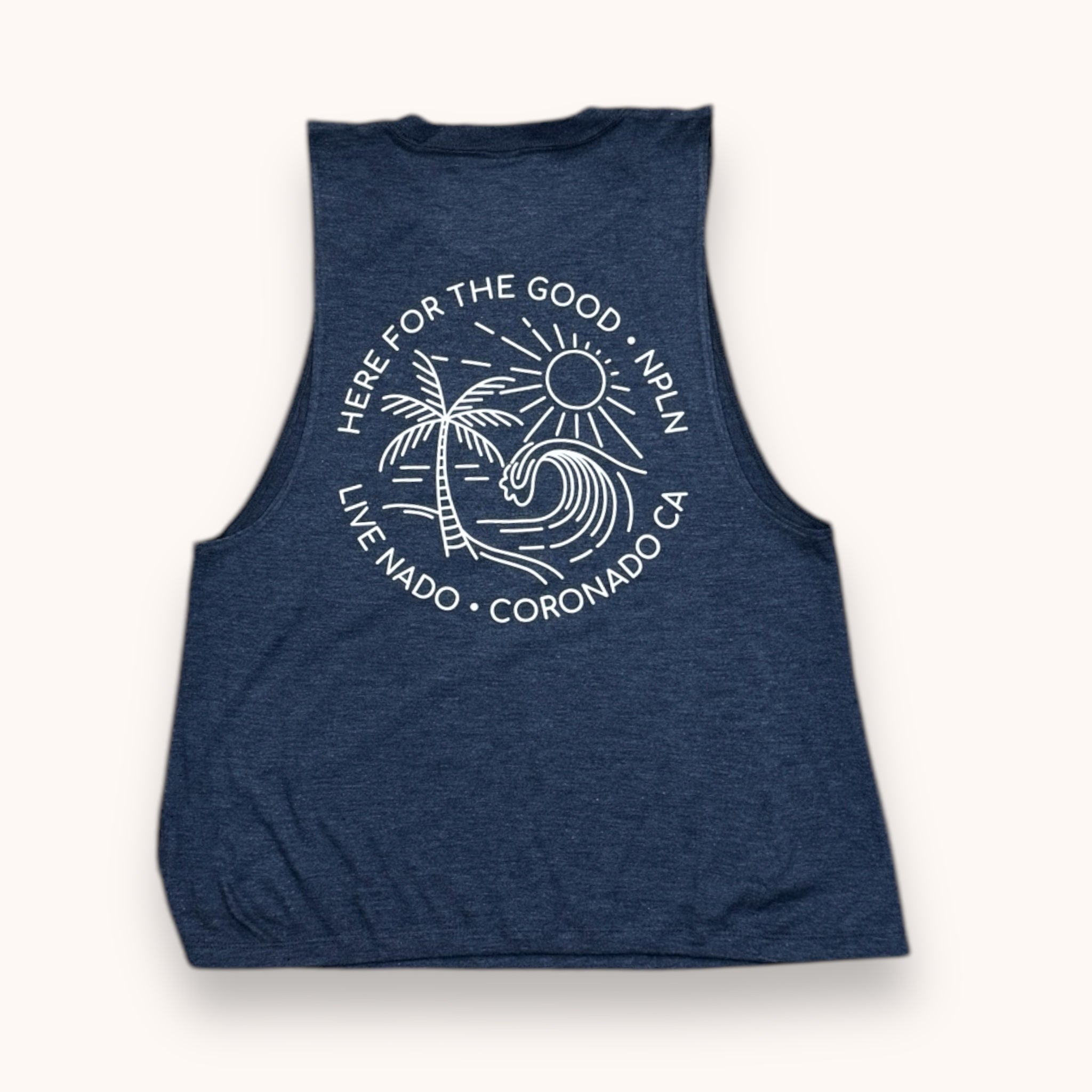 A blue heathered tank top with a graphic design that includes a sun and palm trees and text 'HERE FOR THE GOOD NADY', along with the location 'CORONADO, CA'.