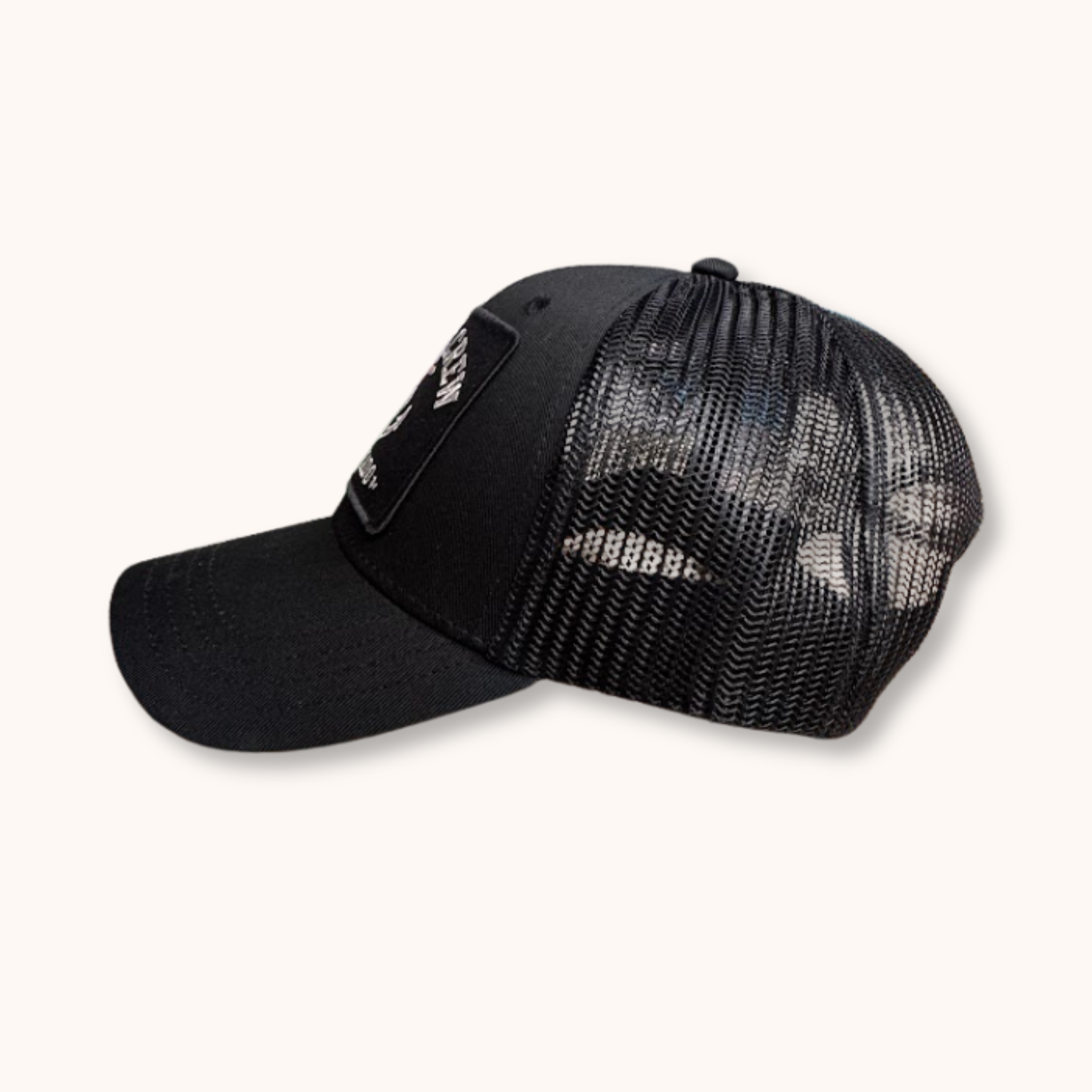 Black mesh cap on a white background